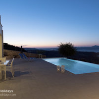04 Villa Armonia dining and pool terrace at dusk
