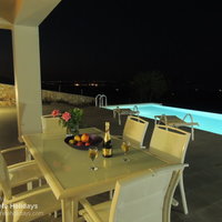 12 Armonia dining and pool terrace at night